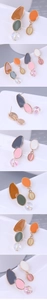 Detailed view of asymmetric geometric hoop earrings with resin charms and glitter beads