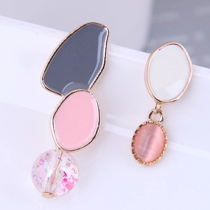 Asymmetric floral vine earrings with pink cat eye stone and colorful resin charms