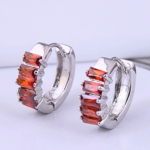 Minimalist silver hoop earrings with four rectangular orange-red zircon gemstones