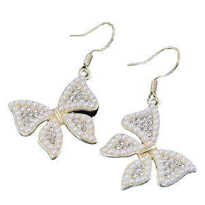 Elegant butterfly earrings with gold metal base, white pearls and sparkling crystals