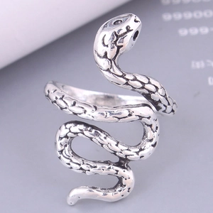 Close-up of vintage snake ring showing detailed scales and antique silver finish
