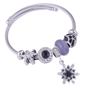 Silver snowflake bangle with purple beads and sparkling crystal charms for women