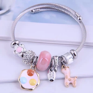 Silver stainless steel open bangle with pink enamel flower charms and giraffe pendant