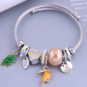 Silver stainless steel wire open bracelet with green enamel leaf and colorful charms