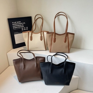 Minimalist faux leather tote bags in four colors with slim handles for women