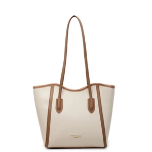 Minimalist off-white leather tote bag with brown trim and long shoulder straps
