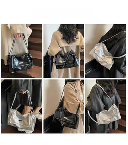 Model showing black and silver chain tote bags in various shoulder and hand-carry styles