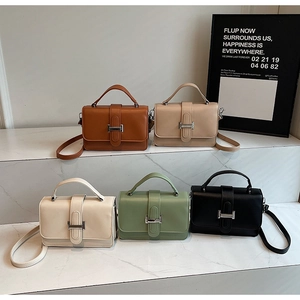 Minimalist square crossbody bags for women in five colors displayed on marble steps