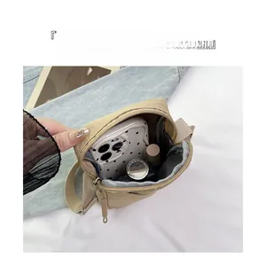 Internal view of the beige crossbody phone bag showing high capacity storage for phone and lipstick