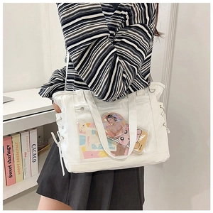 White leather ita bag with large clear PVC window and adjustable straps for crossbody use