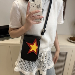 Minimalist black leather crossbody bag for phone with red and yellow star patchwork details