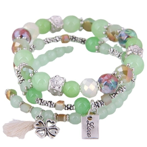 Three-layer green beaded wrap bracelet with Love tag, clover charm and beige tassel