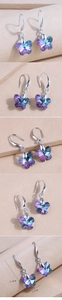 Detailed views of purple and blue gradient crystal butterfly earrings with silver hooks