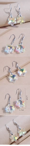 Detail shot of plum blossom crystal earrings showing 4.5cm length and 1.7cm width