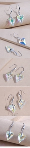 Detail view of heart-shaped crystal earrings showing size measurements of 4.0cm and 1.5cm
