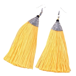 Bohemian style long ginger yellow tassel earrings with silver embossed metal caps and black beads