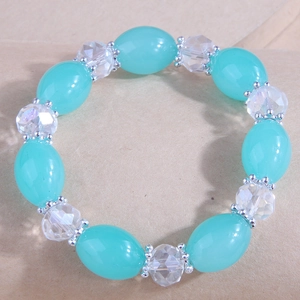 Close-up of tiffany blue beads and transparent faceted crystal beads on the bracelet