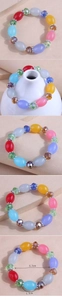 Detail view of colorful beaded bracelet showing 1.5cm beads and 5.5cm inner diameter
