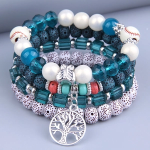 Bohemian multilayer beaded bracelet set featuring a Tree of Life charm and baseball beads