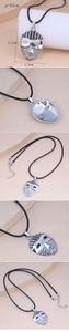 Tribal mask pendant on black wax cord with adjustable chain and size measurements