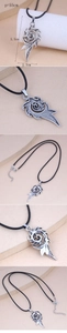 Close-up of vintage flame texture pendant with 55cm black wax rope necklace measurements