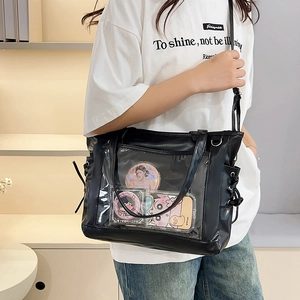 Minimalist black PU ita bag with clear PVC window and adjustable shoulder straps