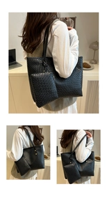 Detail of black woven tote bag with matching inner pouch and long shoulder straps