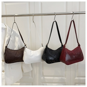 Crocodile pattern half-moon shoulder bags in brown, white, black, and wine red colors