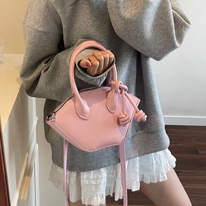 Mini sac ville rose forme coquillage avec poignée et nœuds latéraux en trapèze