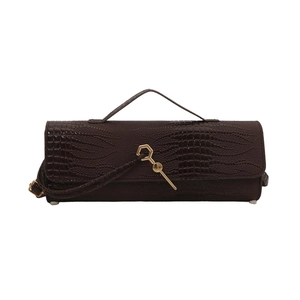 Dark brown faux crocodile leather baguette bag with a golden hexagonal clasp and top handle