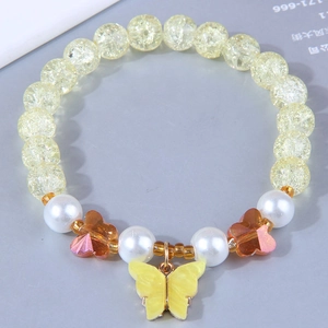 Fashionable beaded bracelet with yellow crackle beads and a butterfly enamel pendant