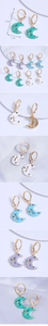 Size detail of crescent moon earrings with colorful enamel and zircon crystals
