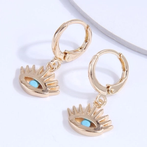 Créoles dorées bohèmes avec pendentifs œil maléfique et perles bleues décoratives