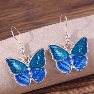Elegant butterfly drop earrings with blue gradient enamel and golden fish hooks