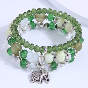 Three-layer stacked beaded bracelet with green crystal beads and silver elephant pendant
