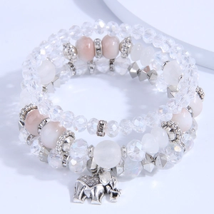 Three-layer glass bead elastic bracelet featuring a vintage silver elephant charm