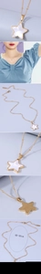 Detail of star pendant necklace with white shell inlay and 40-45cm adjustable gold chain