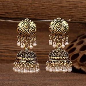 Retro golden Jhumka bell earrings with heart embossing and white pearl tassels