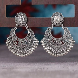 Vintage silver drop earrings with moon-shaped filigree and hanging metal beads