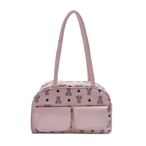 Pink underarm pillow bag with bear pattern and double straps on white background