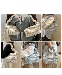 Detail shots of floral bow shoulder bags with ruffled cloud straps in white and blue