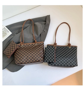 Detail view of checkered tote bag with matching zipper pouch and printed pattern