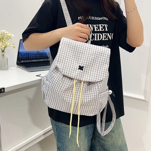 Lightweight black and white checkered canvas drawstring backpack with yellow accents