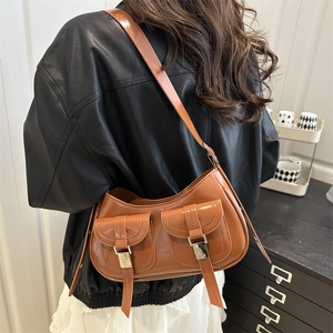 Retro caramel brown PU leather crossbody bag with dual front buckle pockets on shoulder