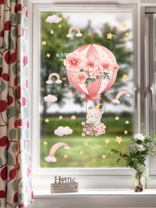 Detail of cartoon hot air balloon window sticker with cute bear and floral clouds