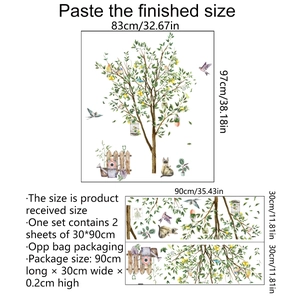 Detail view of wall stickers featuring lemon tree, birds, and cats with size dimensions