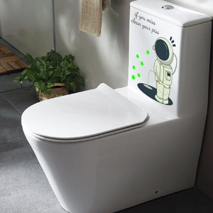 Glow astronaut toilet sticker with green stars and funny English quote for bathroom decor