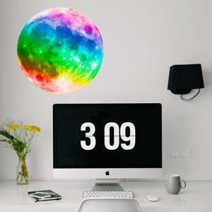 Luminous rainbow moon wall sticker with crater texture in a minimalist Nordic workspace