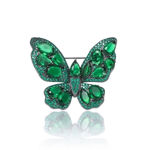 Elegant emerald green butterfly brooch with sparkling crystals and mother of pearl inlay
