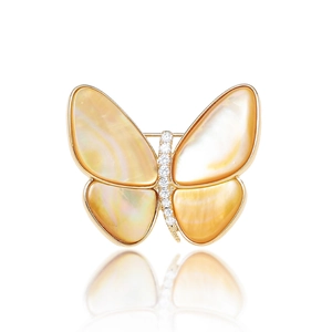 Detailed view of elegant golden butterfly brooch featuring natural yellow mother-of-pearl wings